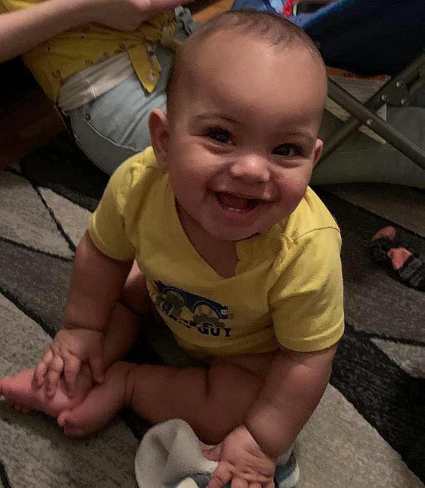 Jayden is registered to the contest to win money with this photo: baby, cheek, crawling, eye, face, finger, floor, flooring, grass, hand, happy, head, iris, joy, mouth, nose, person, skin, smile, thumb