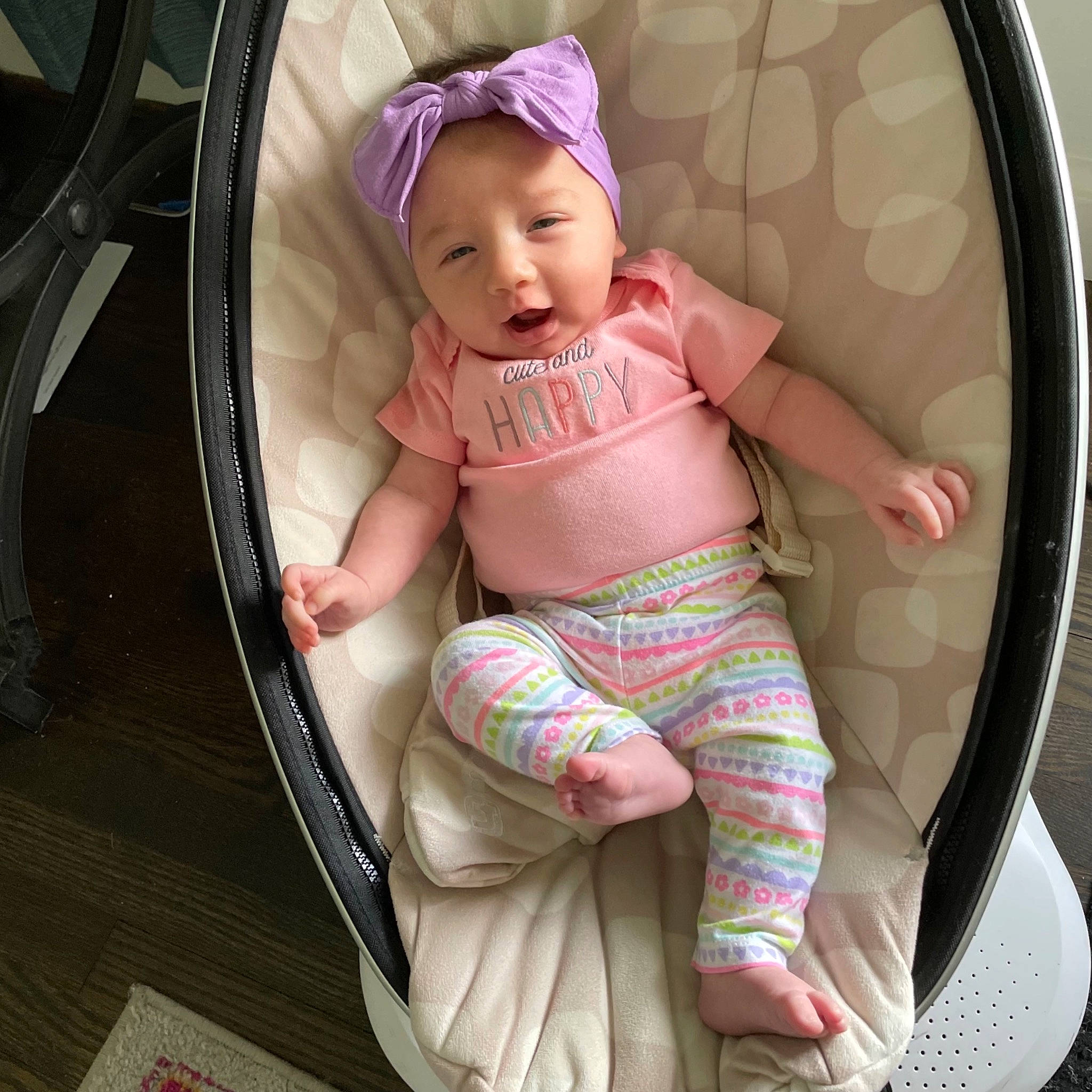 Delilah joined the competition — help win amazing prizes! auto_part, baby, baby_carriage, baby_toddler_clothing, car_seat, child, comfort, facial_expression, finger, happy, headwear, human, leg, mouth, people, person, pink, product, sitting, skin