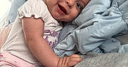 Avery joined the competition — help win amazing prizes! baby, child, infant, bed, blanket, clothing, cute, expression, face, floral, happy, indoors, infant_girl, laying, person, pink, portrait, shirt, smile, toddler