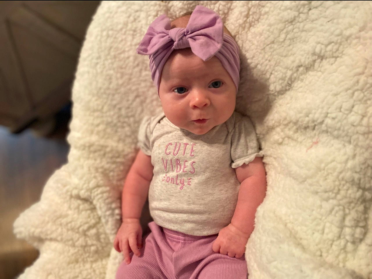 Alana is registered to the contest to win money with this photo: baby, baby_toddler_clothing, cheek, chin, clothing, comfort, eye, face, happy, hat, head, headwear, iris, linens, lip, person, pink, skin, sleeve, smile