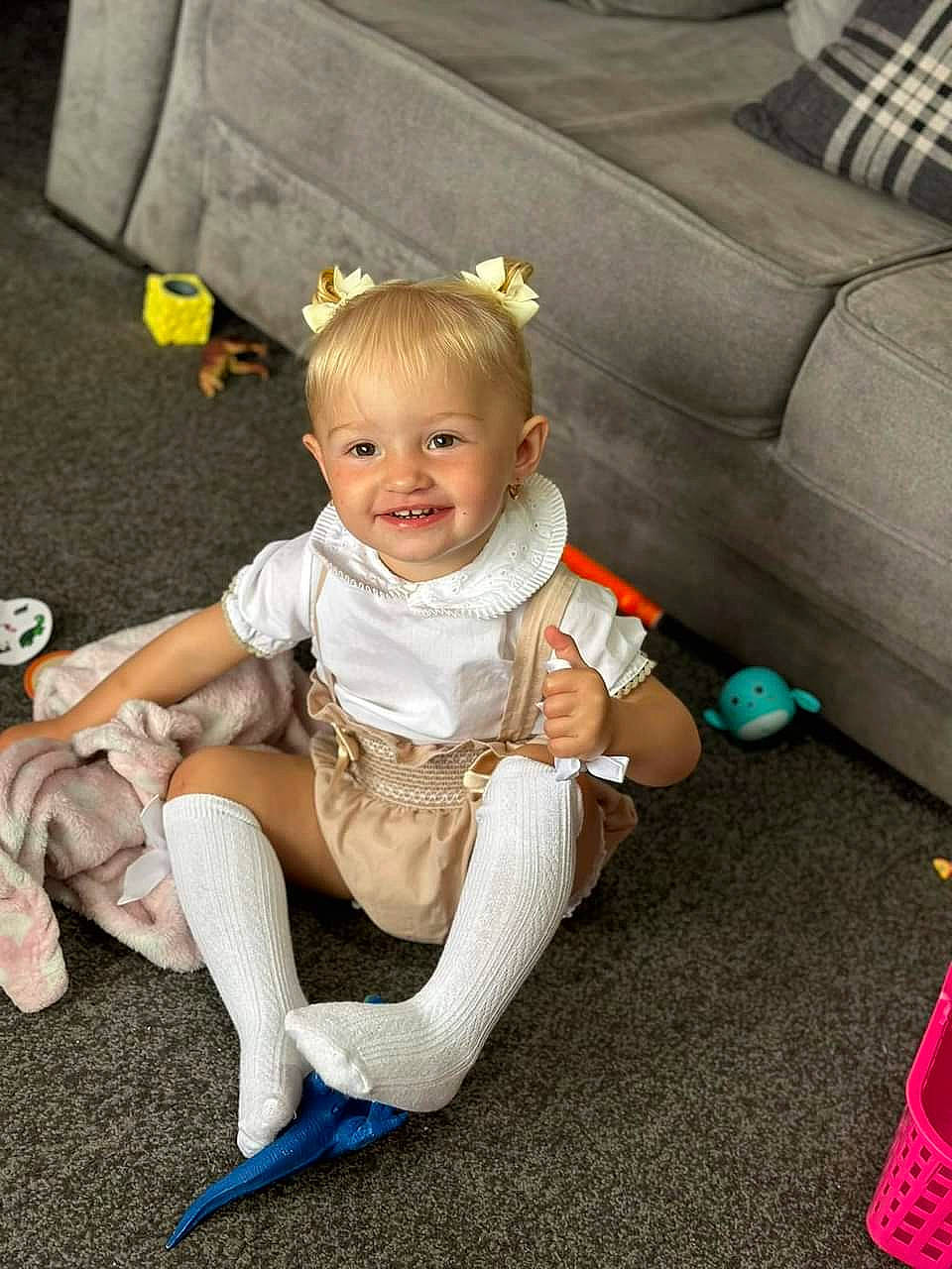 Marliyah-azalea is registered to the contest to win money with this photo: baby, baby_toddler_clothing, barefoot, child, comfort, couch, flooring, foot, fun, grass, happy, head, human_leg, joy, knee, person, product, sitting, skin, smile