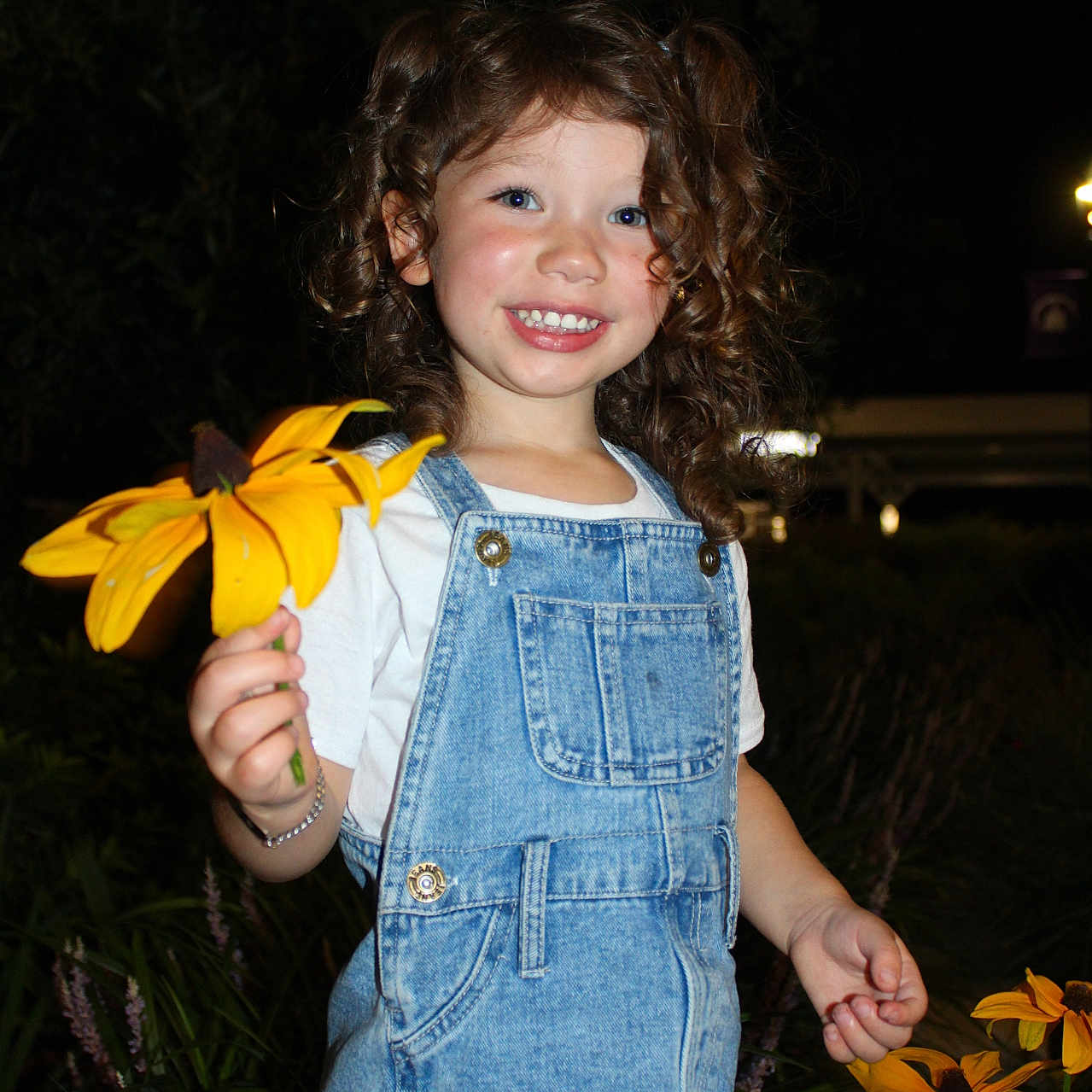 Aurora joined the competition — help win amazing prizes! bodypart, child, clothing, face, female, finger, flower, girl, hand, happy, head, jeans, pants, person, petal, photography, plant, portrait, smile, vest