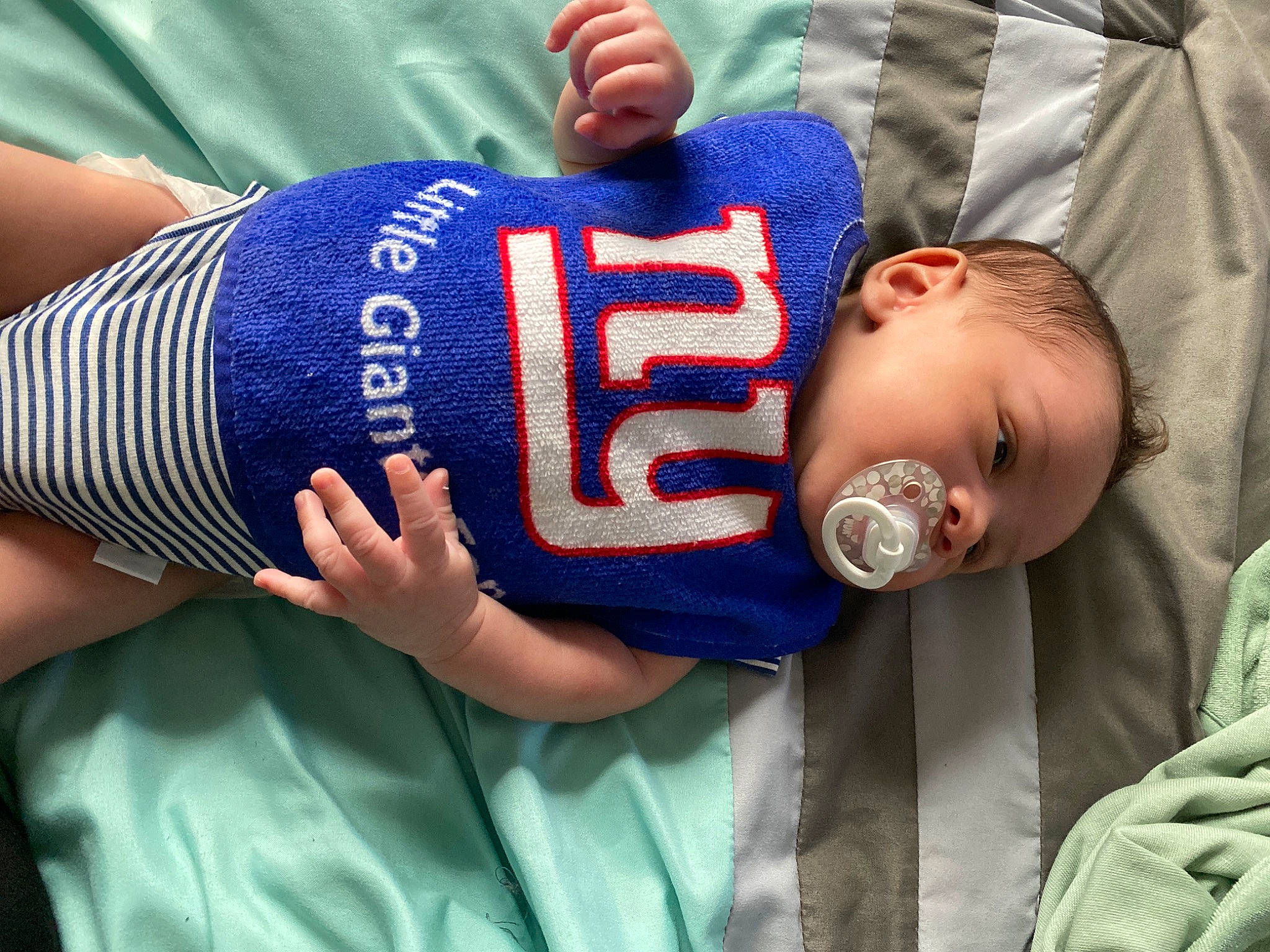 Elias Callwood is registered to the contest to win money with this photo: arm, baby, child, drink, finger, gesture, hand, person, toddler, water