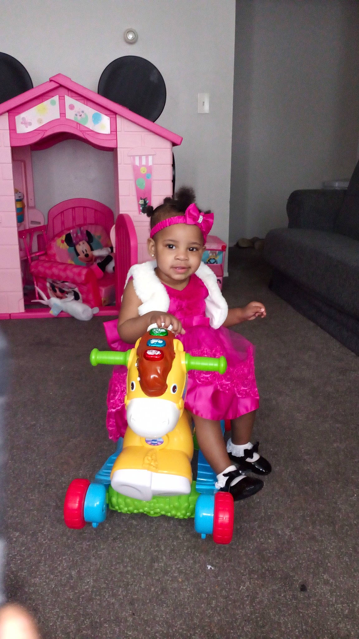 A'Ziyah joined the competition — help win amazing prizes! baby, child, couch, event, fun, happy, headwear, lap, leisure, magenta, person, pink, play, recreation, riding_toy, skin, smile, snapshot, tire, toddler