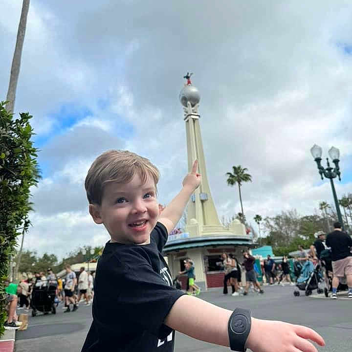 Carter Blake joined the competition — help win amazing prizes! amusementpark, architecture, boy, building, child, city, clothing, downtown, face, fun, head, landmark, male, person, photography, portrait, shorts, themepark, tower, urban