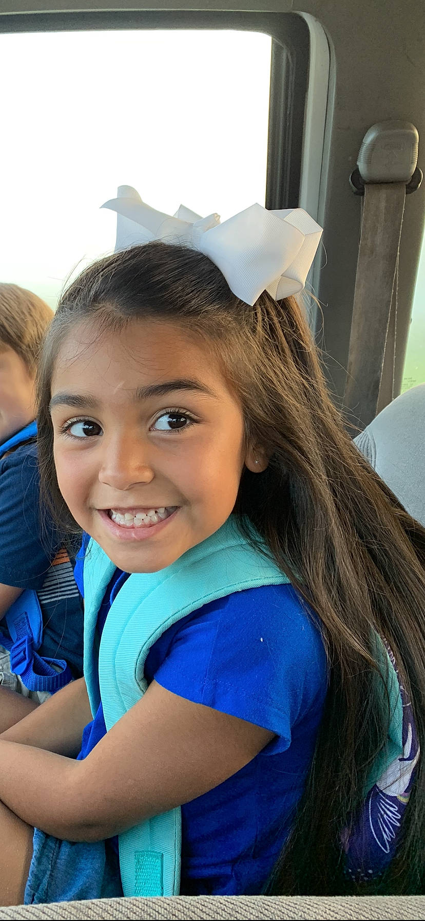 Abbi is registered to the contest to win money with this photo: blue, brown_hair, child, child_model, ear, face, facial_expression, fashion_accessory, hair, hair_accessory, hairstyle, happy, head, headband, headgear, joy, long_hair, person, smile, toddler