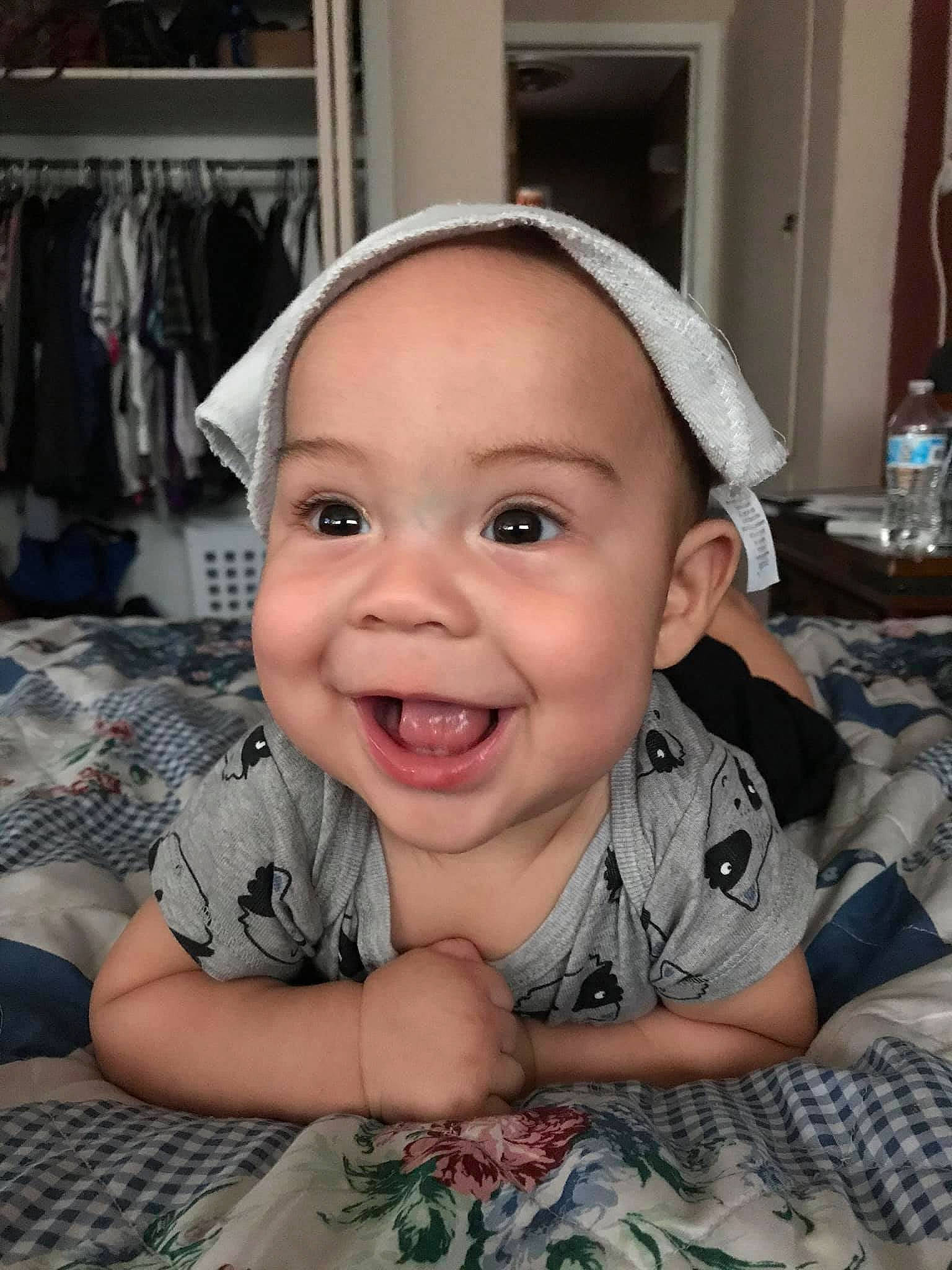 Jaime joined the competition — help win amazing prizes! baby, cheek, child, chin, ear, face, facial_expression, forehead, head, headgear, joy, laugh, nose, person, skin, smile, toddler