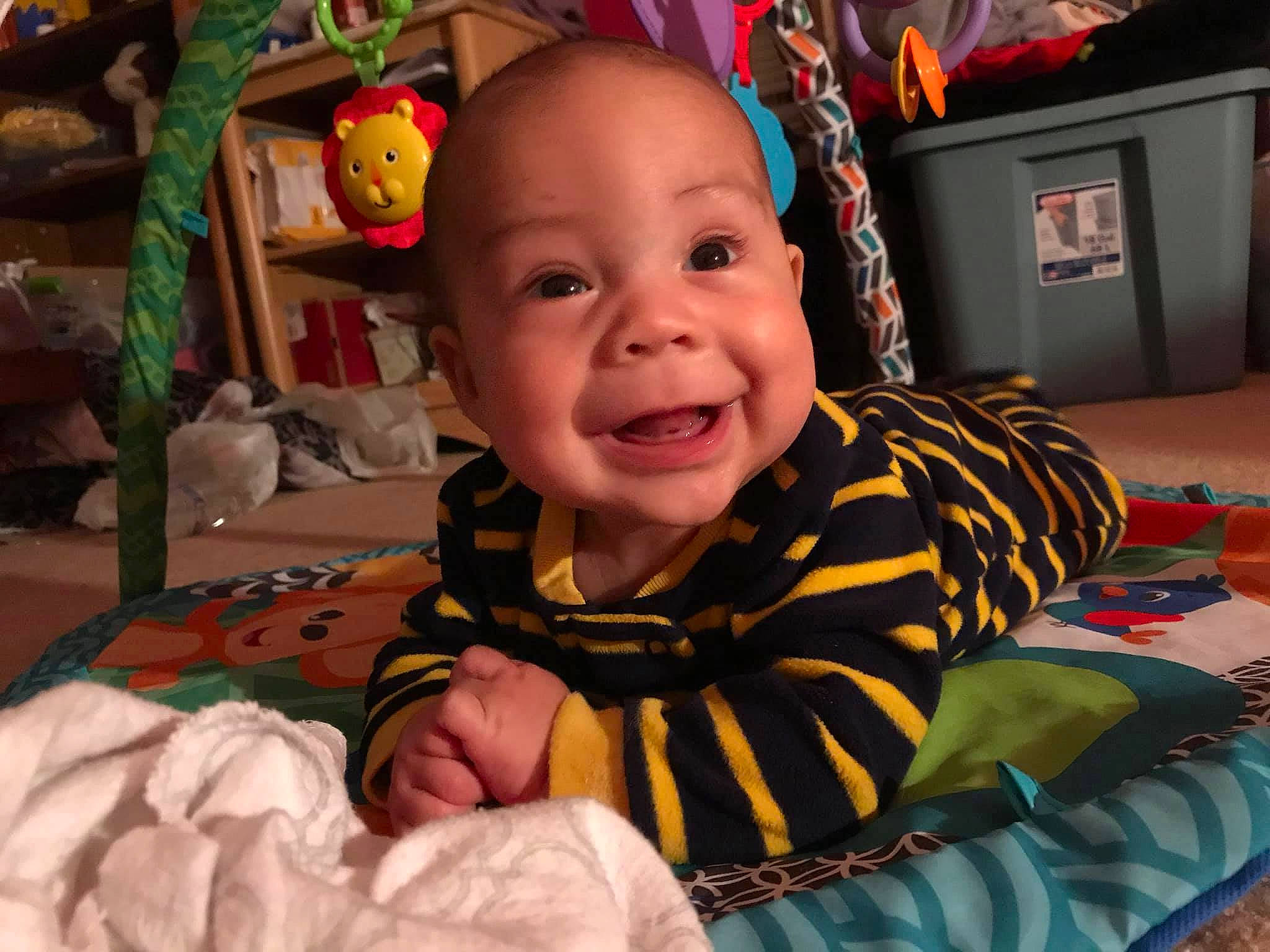 Jaime joined the competition — help win amazing prizes! baby, cheek, child, eye, face, facial_expression, happy, head, iris, joy, laugh, person, play, room, sitting, skin, smile, toddler