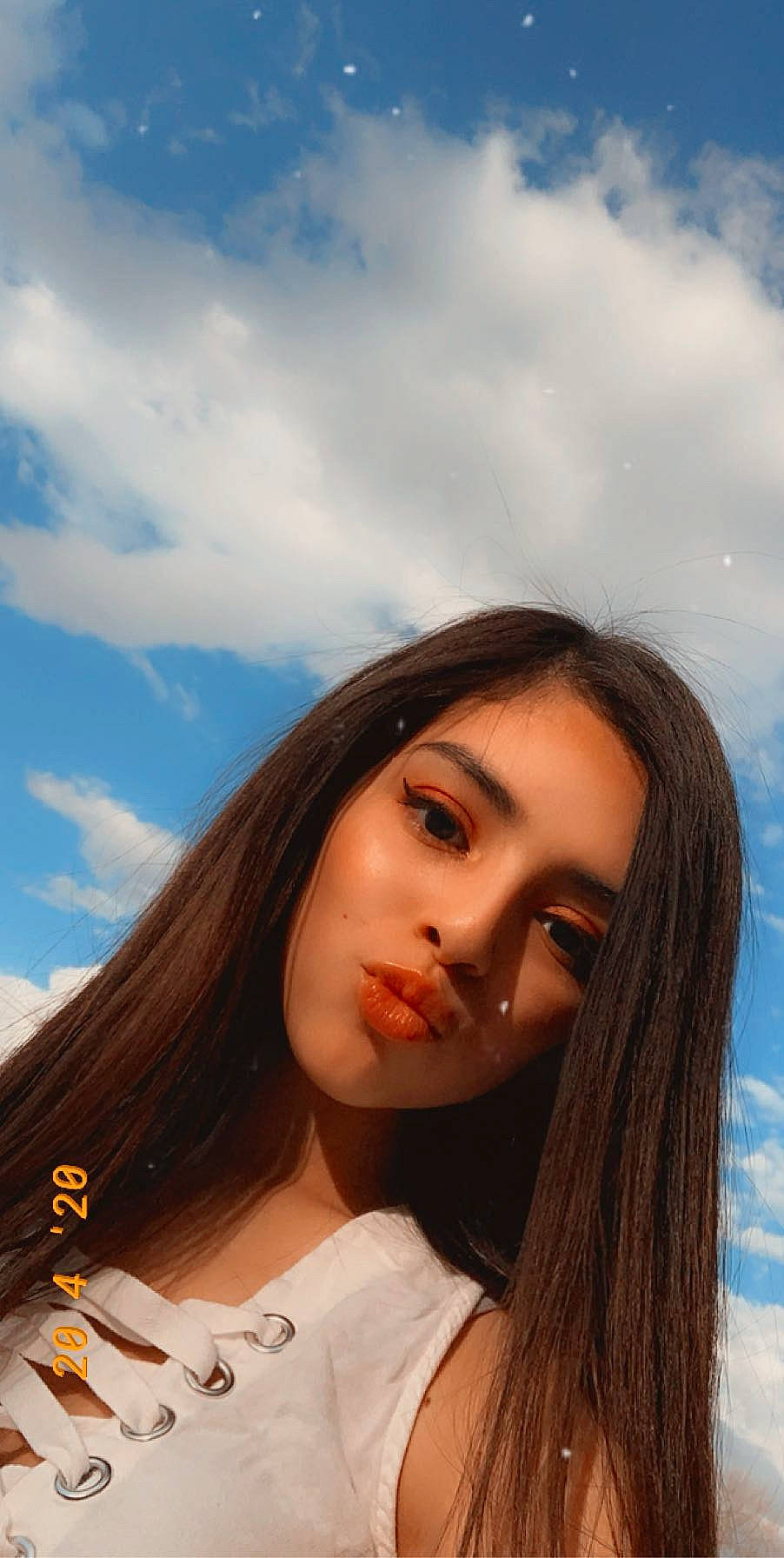 Daniela joined the competition — help win amazing prizes! beauty, black_hair, blue, brown_hair, eye, face, hair, hairstyle, happy, leisure, lip, long_hair, model, person, photo_shoot, photography, portrait, sky, smile, vacation