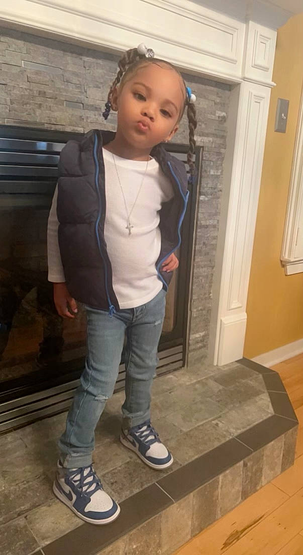 Amina Nikole joined the competition — help win amazing prizes! baby_toddler_clothing, blazer, denim, door, floor, flooring, hardwood, human_leg, knee, leg, outdoor_shoe, outerwear, person, shoe, sleeve, sportswear, standing, thigh, toddler, waist