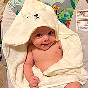 Anya Elaine Pulciani is registered to the contest to win money with this photo: animal_print, baby, baby_bouncer, bear, bird, blanket, child, cozy, cute, giraffe, happy, hood, indoor, infant, skin, sloth, smile, soft, towel, wrapped