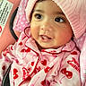 Jaynara Rodas is registered to the contest to win money with this photo: baby, infant, child, portrait, smiling, tongue_out, pink, hat, knit_hat, onesie, cherry_pattern, heart_pattern, car_seat, seatbelt, close_up, indoor, happy, face, blanket, photography