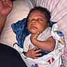 Jayce is registered to the contest to win money with this photo: baby, sleeping, blanket, pillow, bed, hand, infant, person, resting, cozy, curly_hair, soft, comfort, child, cute, indoors, peaceful, wrapped, toddler, nursery