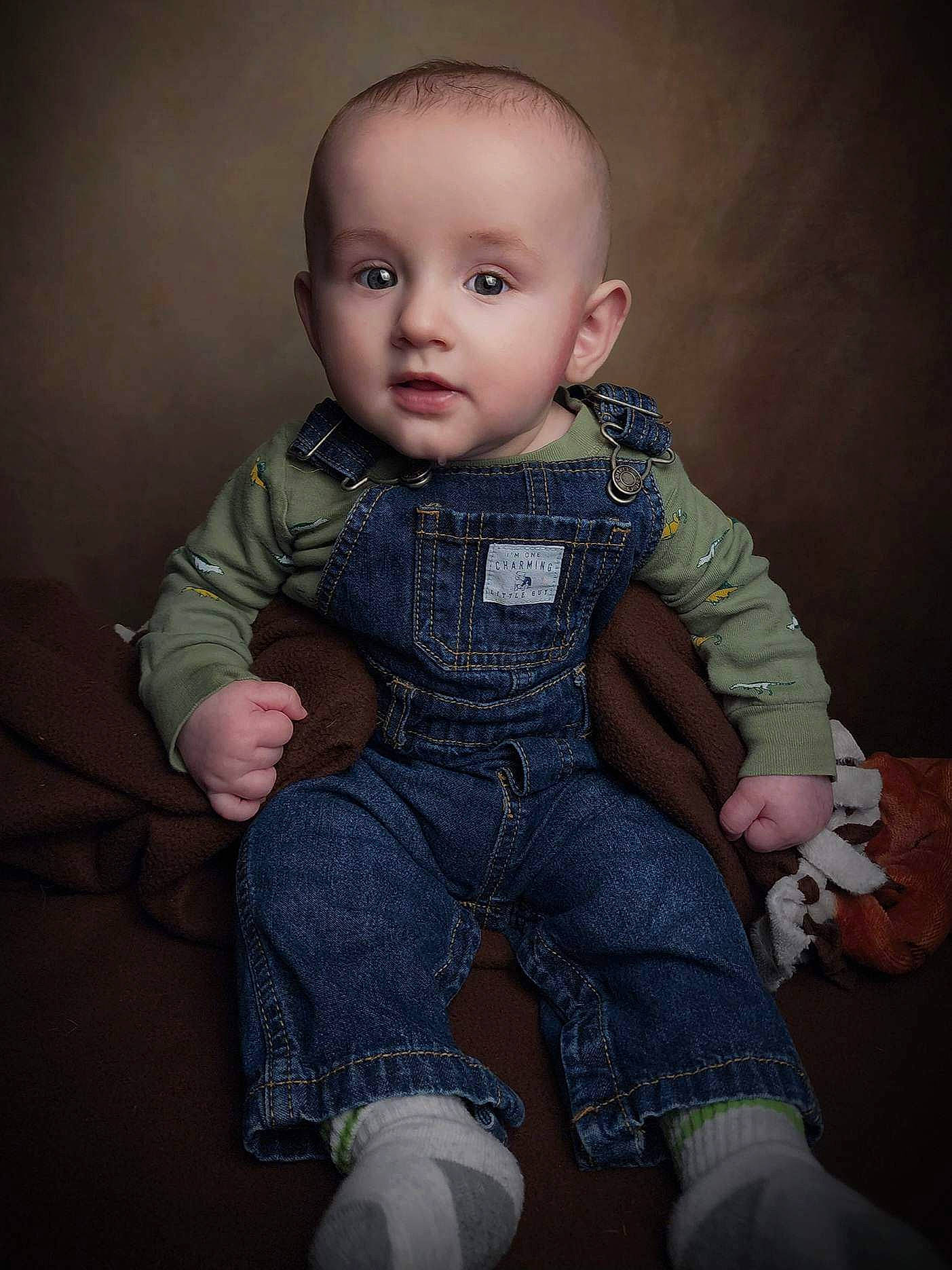 Carter is registered to the contest to win money with this photo: baby, baby_toddler_clothing, cheek, chest, child, comfort, darkness, flash_photography, flesh, fur, human_body, iris, lip, pattern, person, portrait_photography, sitting, skin, sleeve, t_shirt