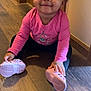 bodypart, child, clothing, face, female, footwear, girl, hardwood, head, indoors, interiordesign, pants, person, photography, portrait, runningshoe, shoe, sitting, sneaker, wood