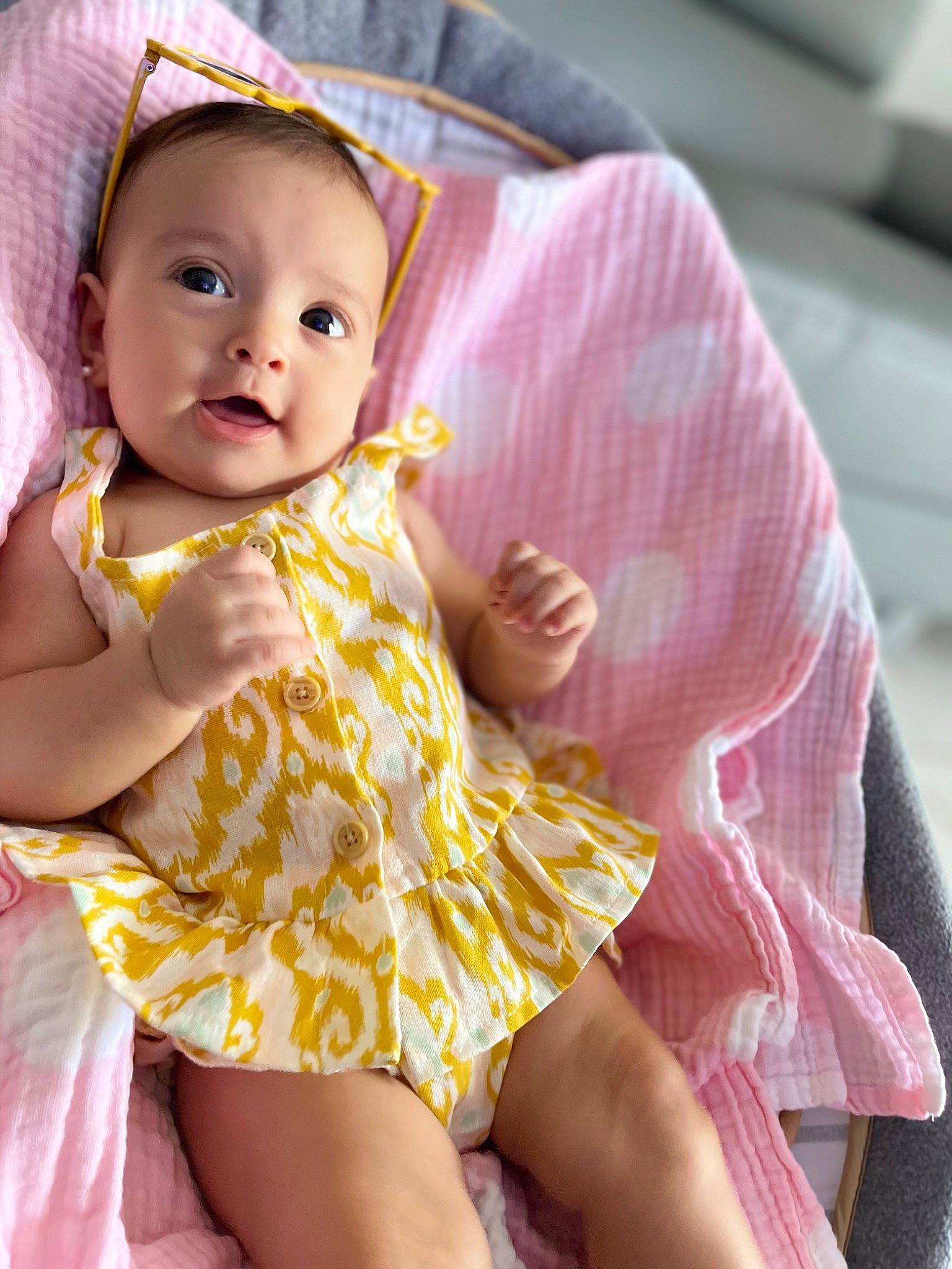 Amaya is registered to the contest to win money with this photo: baby, baby_toddler_clothing, cheek, child, comfort, day_dress, dress, eye, happy, human_body, human_leg, iris, magenta, one_piece_garment, person, pink, purple, skin, textile, thigh