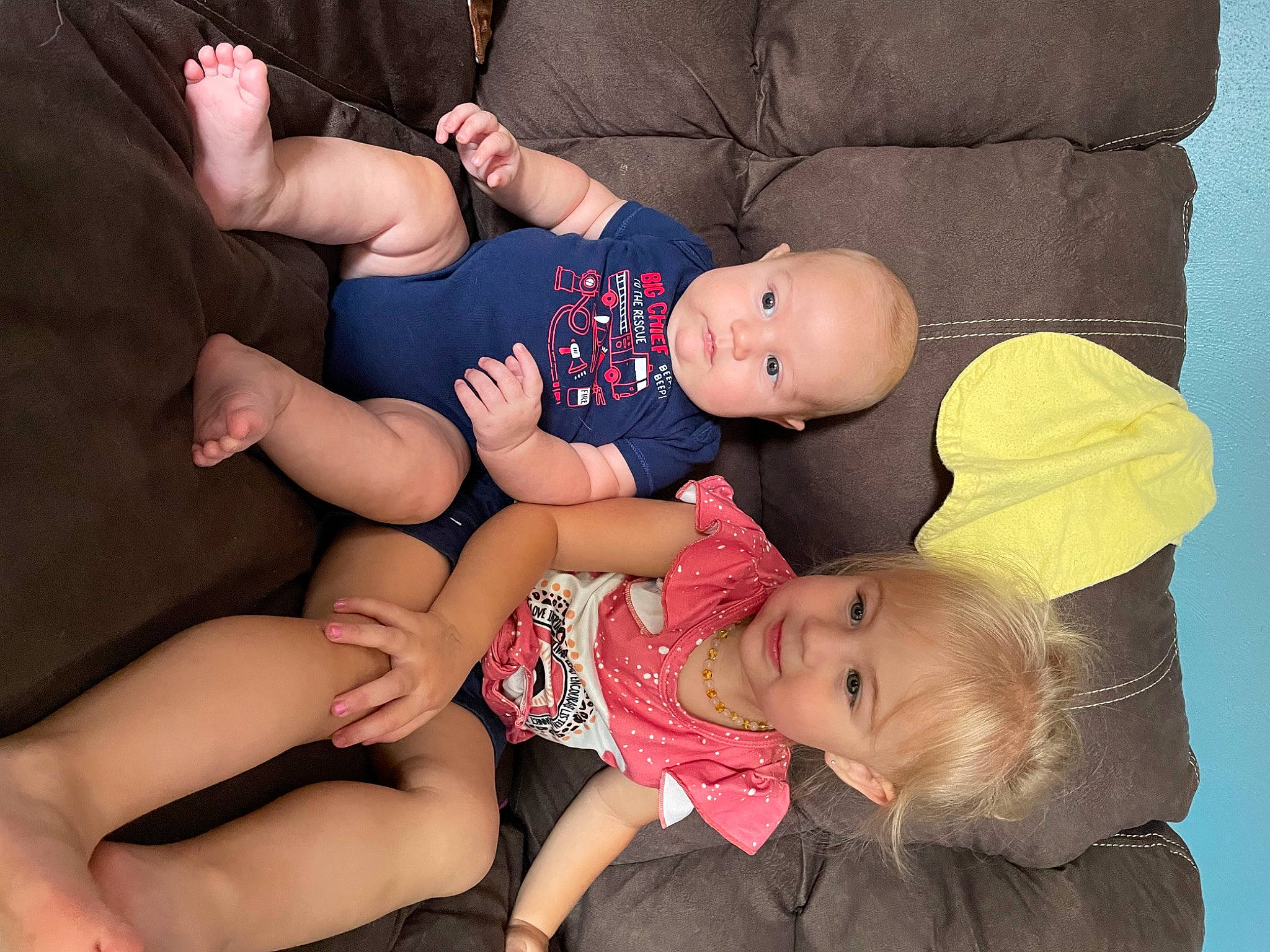 Lilliana is registered to the contest to win money with this photo: abdomen, arm, baby, baby_toddler_clothing, cheek, comfort, couch, finger, fun, hand, happy, hat, human_leg, joy, lap, leg, mouth, person, skin, thigh