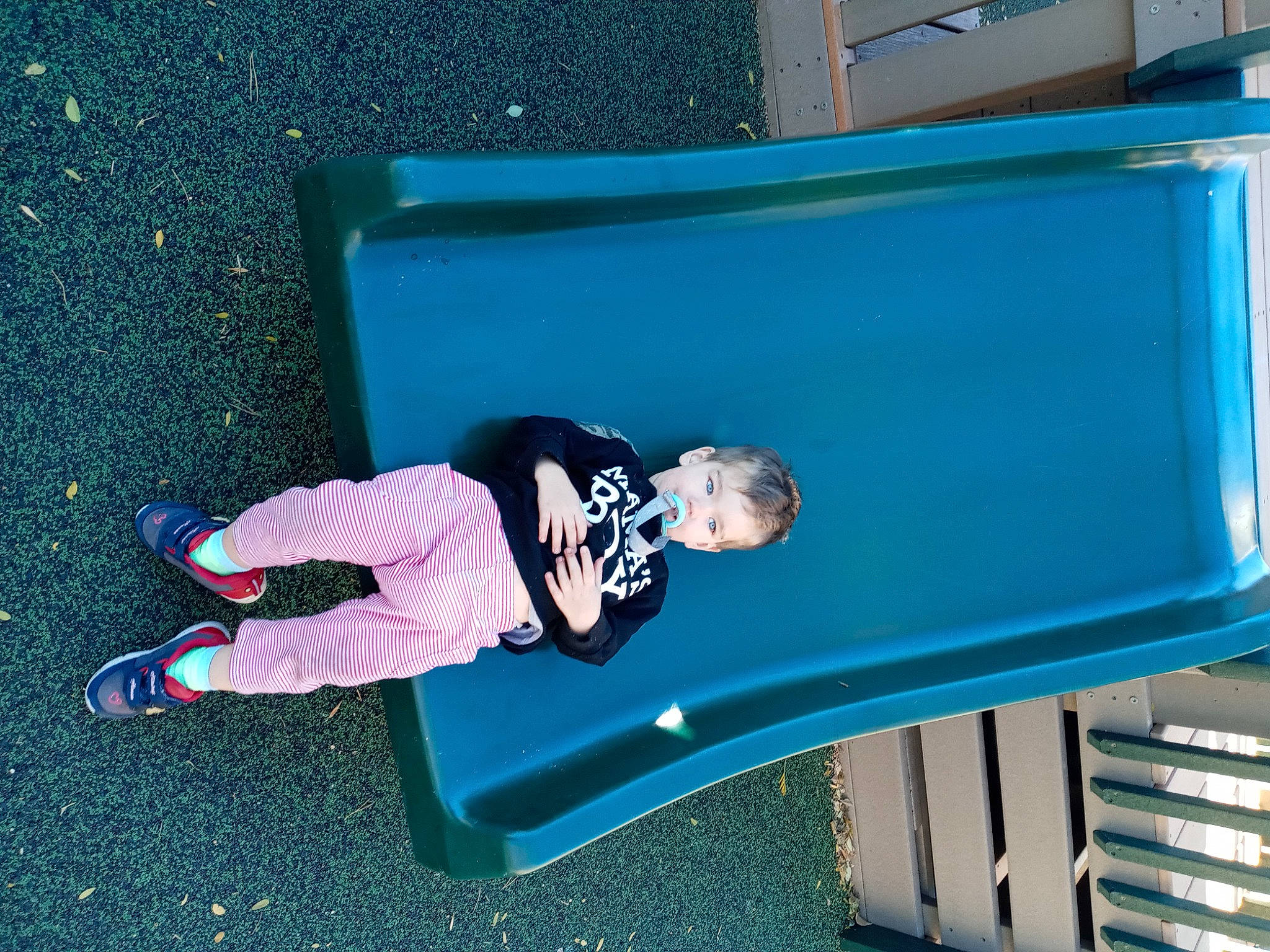 Davion joined the competition — help win amazing prizes! baby, baby_toddler_clothing, blue, child, chute, city, design, electric_blue, fun, leisure, magenta, outdoor_play_equipment, outdoor_shoe, person, play, playground, product, recreation, sitting, toddler