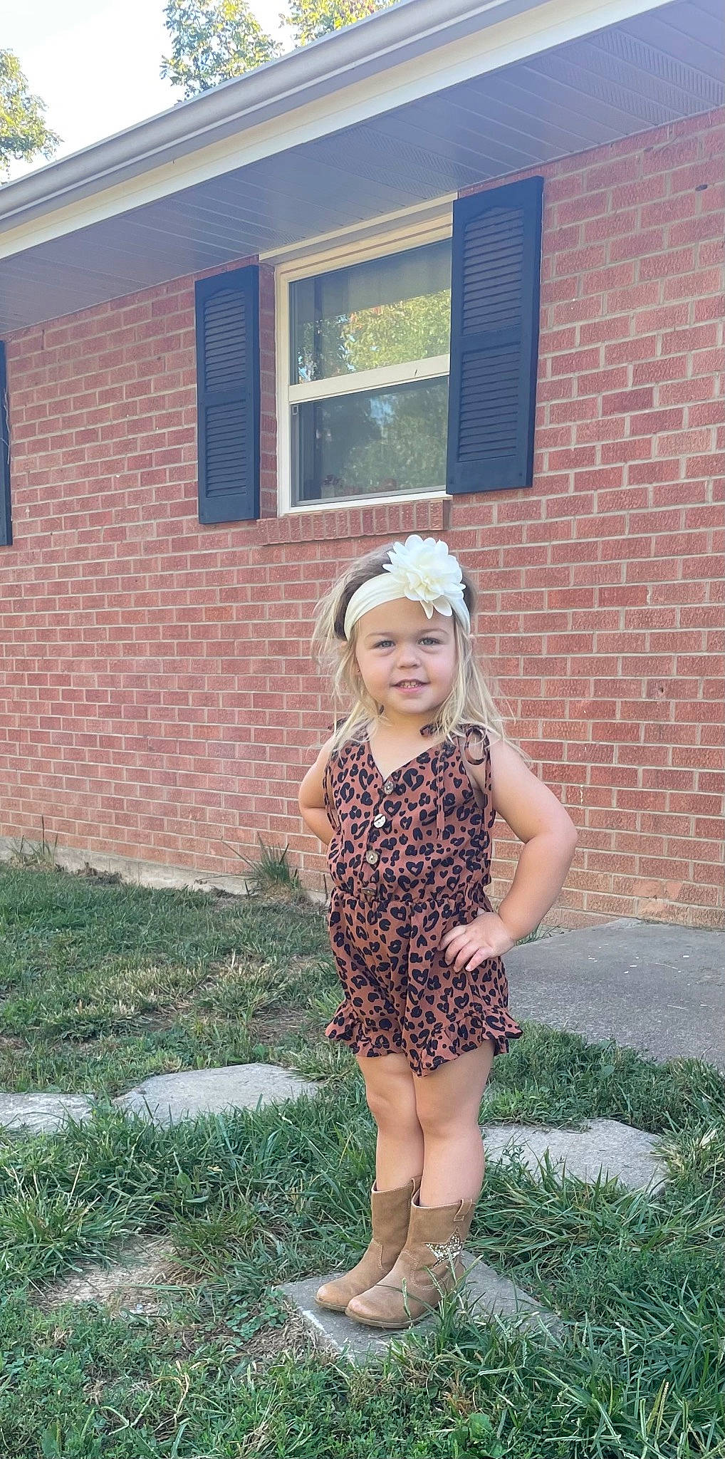 Presleigh joined the competition — help win amazing prizes! brick, brickwork, child, dress, fashion_accessory, fun, garden, grass, happy, headpiece, headwear, house, joy, lawn, pattern, people_in_nature, person, plant, sleeve, smile