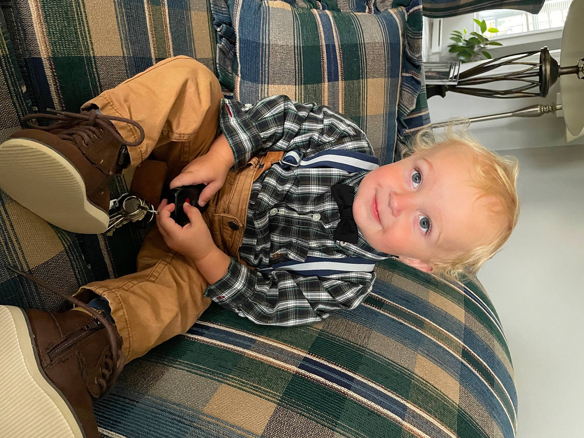 Briar is registered to the contest to win money with this photo: baby, baby_toddler_clothing, child, comfort, fun, hairstyle, human, human_leg, joint, joy, knee, leg, mammal, pattern, person, plaid, room, sitting, tartan, thigh