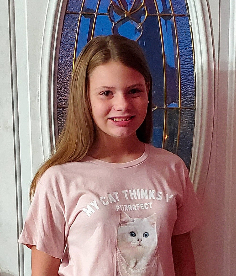 Tabitha joined the competition — help win amazing prizes! baby_toddler_clothing, chin, eye, eyelash, facial_expression, hair, hairstyle, happy, head, iris, jaw, joy, long_hair, neck, organ, person, pink, skin, sleeve, smile