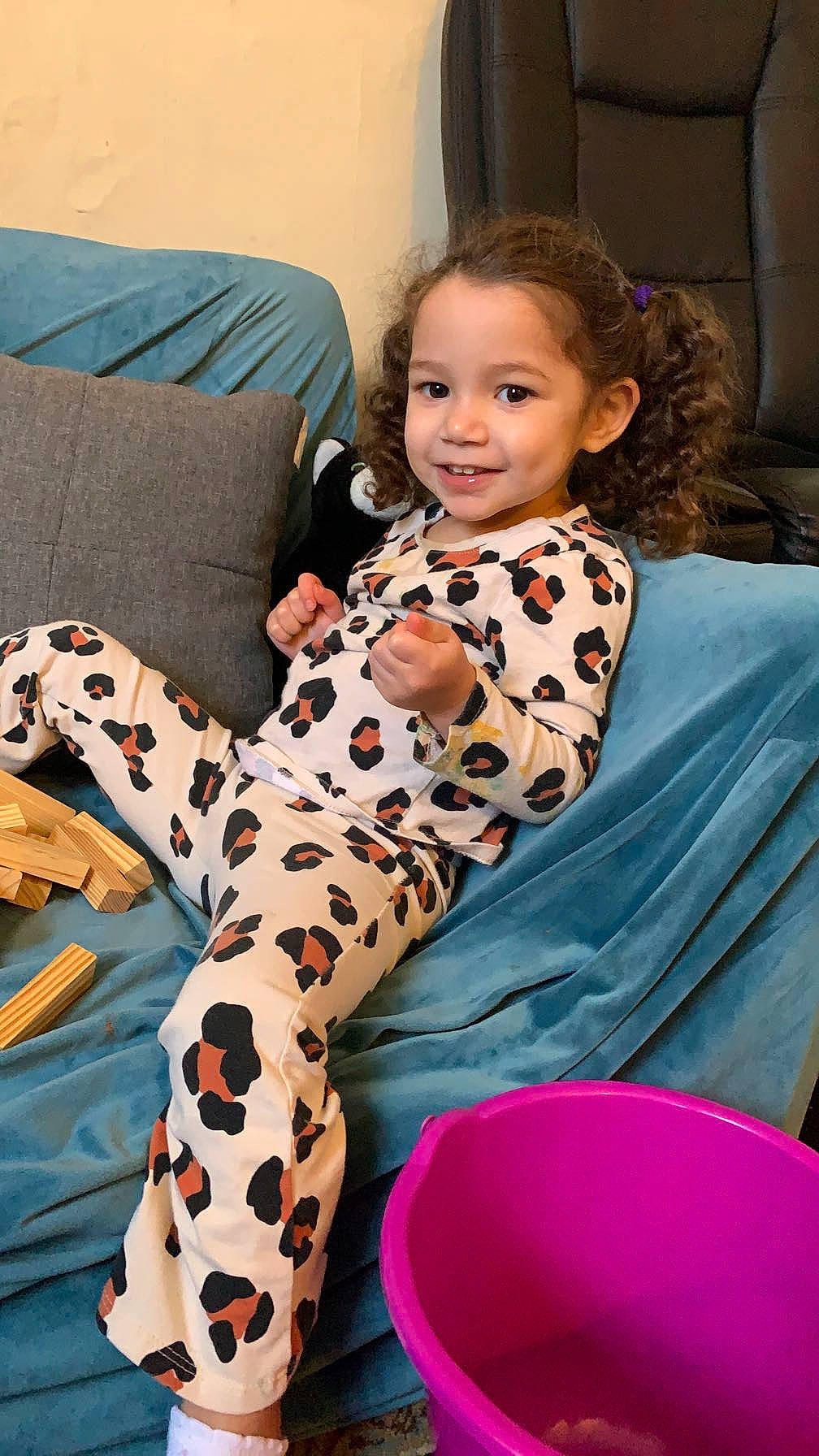 Kiara joined the competition — help win amazing prizes! arm, comfort, couch, flooring, foot, fun, hair, happy, human_body, human_leg, joy, knee, leg, pattern, person, sitting, sleeve, smile, textile, thigh