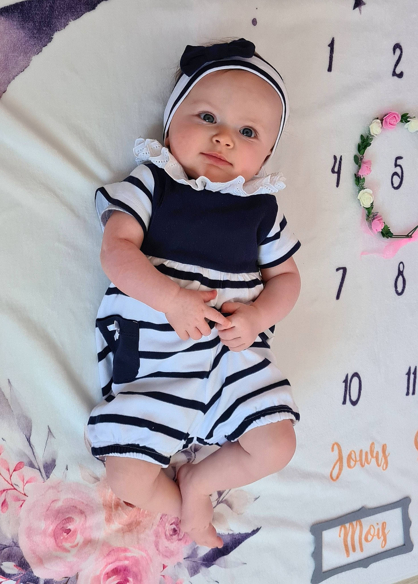 Lyna a rejoint le concours — aidez-le/la à gagner de superbes lots ! baby, baby_toddler_clothing, cap, child, day_dress, happy, hat, headwear, human_leg, magenta, pattern, person, pink, product, shorts, sitting, sleeve, sock, textile, thigh