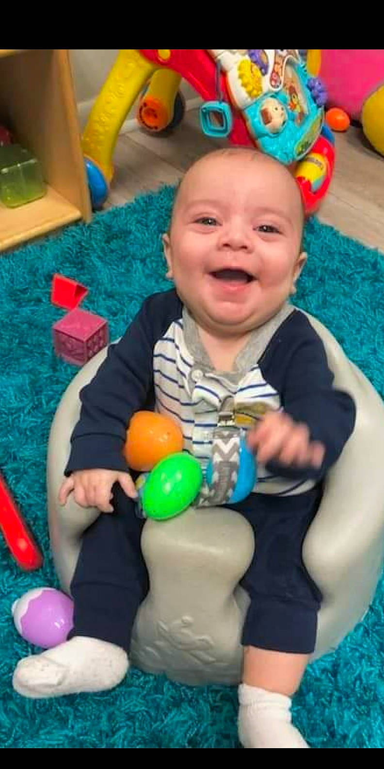 Hugo joined the competition — help win amazing prizes! baby, baby_playing_with_toys, baby_toddler_clothing, blue, cheek, child, eye, facial_expression, fun, happy, head, iris, organ, party_supply, people, person, photograph, product, smile, toddler