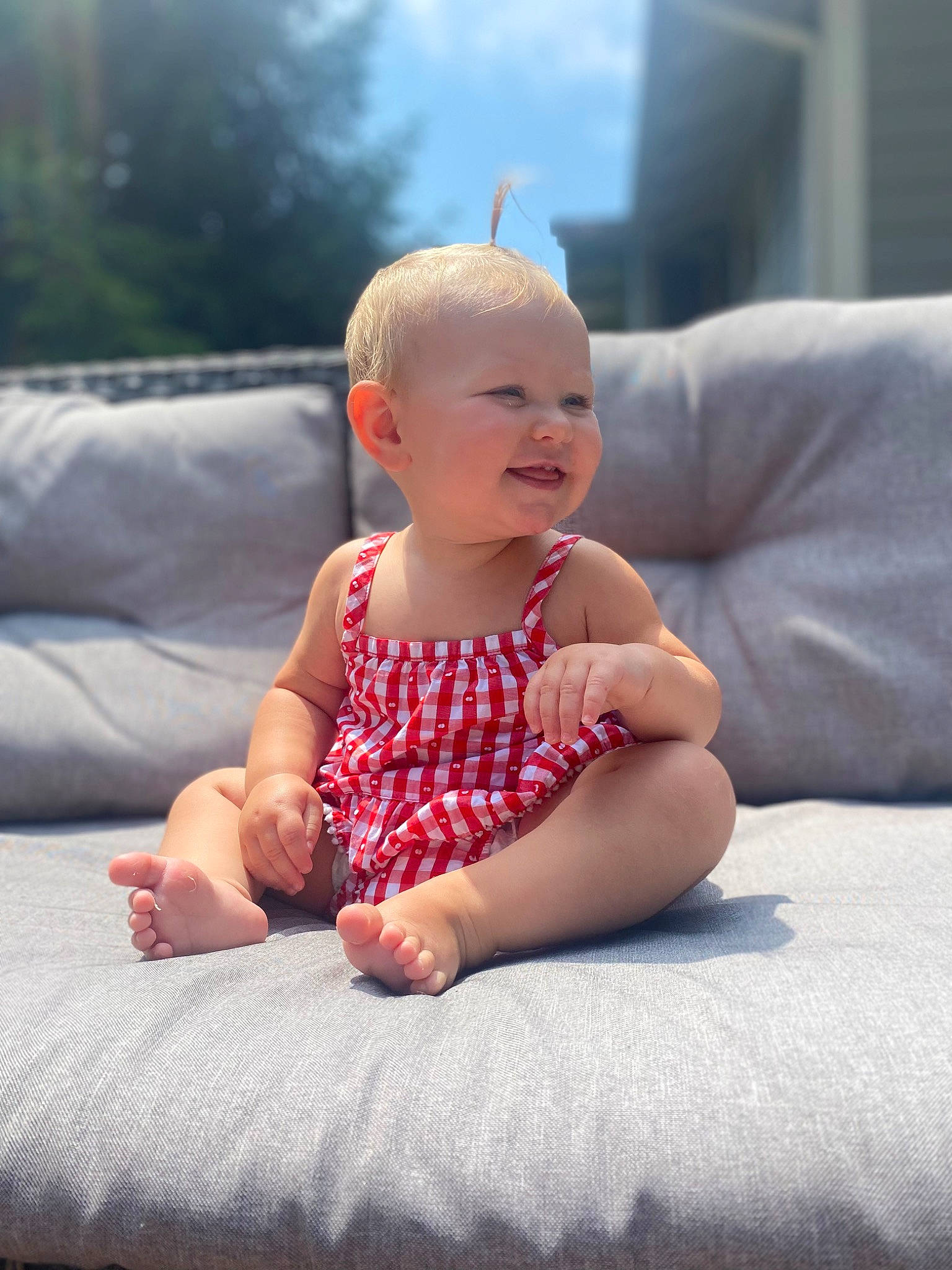Isla joined the competition — help win amazing prizes! baby, baby_toddler_clothing, barefoot, cheek, child, comfort, flash_photography, flooring, foot, fun, grass, happy, human_leg, leg, leisure, person, sitting, skin, sky, smile