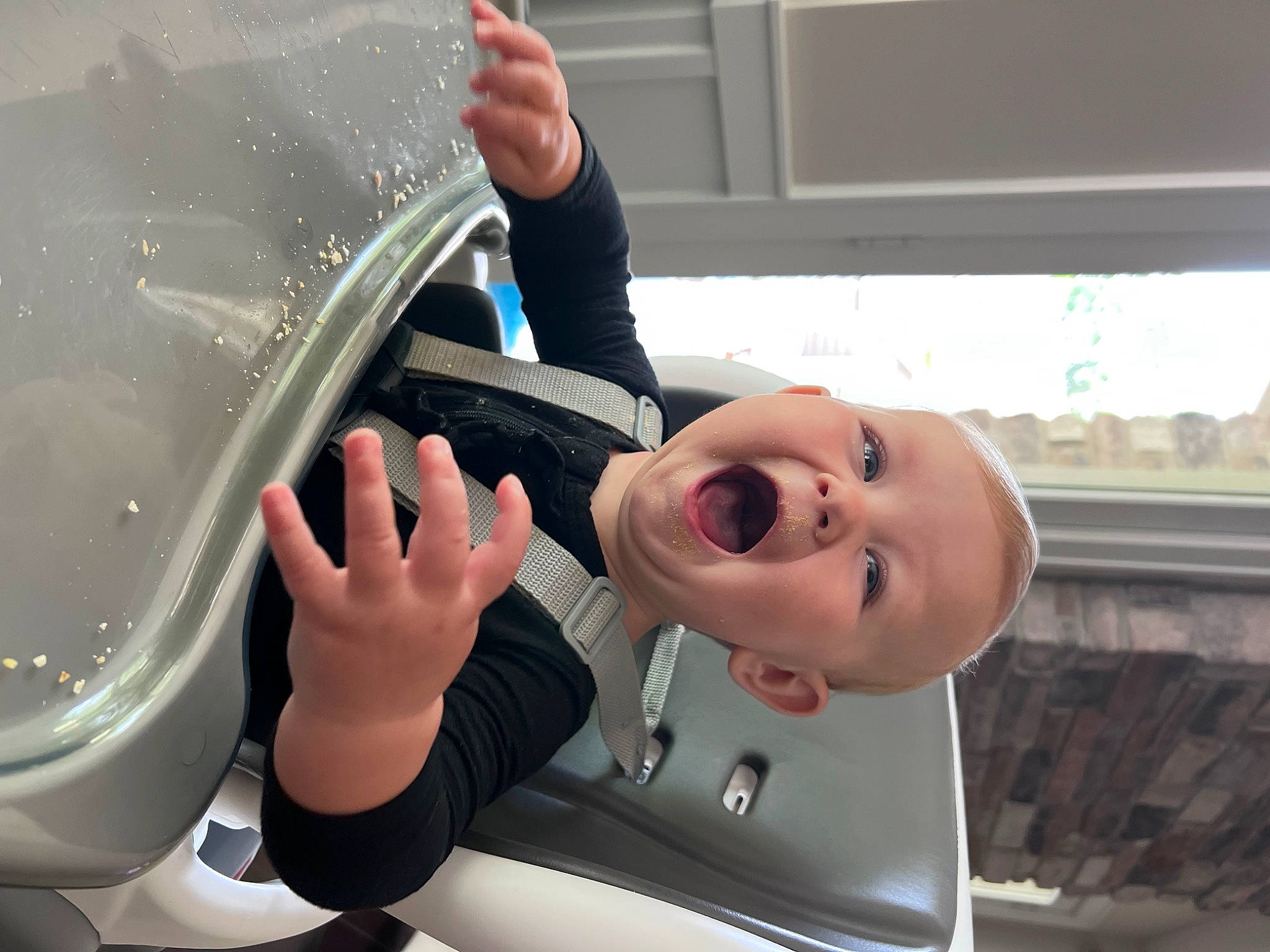 Isla is registered to the contest to win money with this photo: auto_part, automotive_design, automotive_exterior, automotive_lighting, automotive_mirror, baby, car, finger, gesture, hand, hood, mode_of_transport, motor_vehicle, person, smile, steering_wheel, thumb, toddler, vehicle, vehicle_door