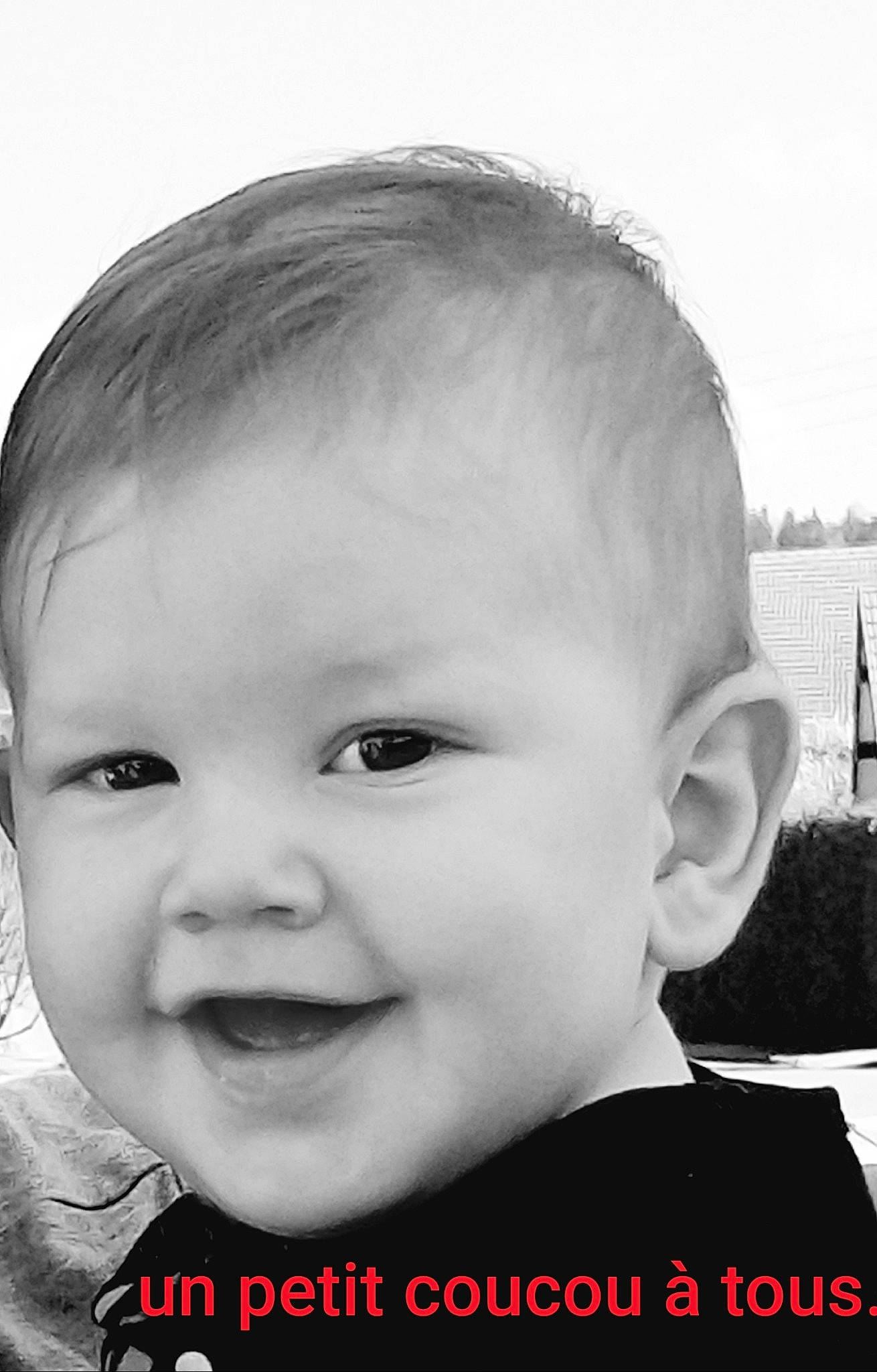 Bastien participe au concours pour gagner de l'argent avec cette photo : baby, black_and_white, cheek, child, chin, close_up, eye, face, facial_expression, forehead, head, human, joy, lip, mouth, nose, person, photograph, photography, skin