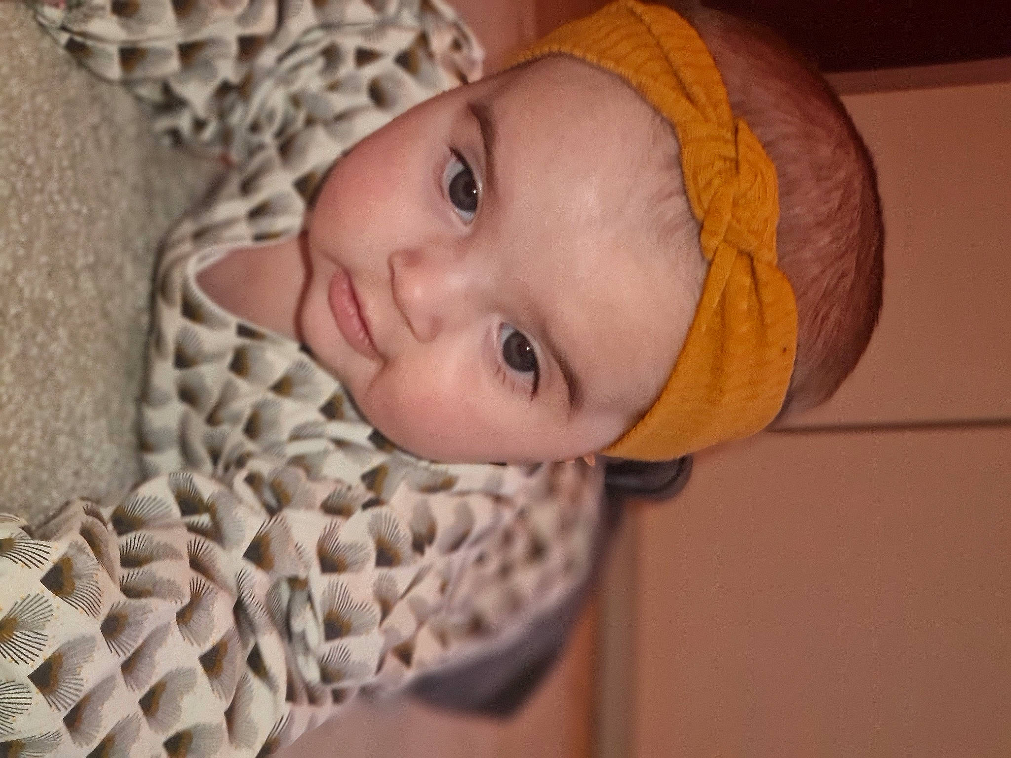 Valentina participe au concours pour gagner de l'argent avec cette photo : cheek, chin, comfort, eye, eyebrow, eyelash, headgear, iris, lip, neck, nose, outerwear, person, skin, sleeve, smile, textile, toddler, wood, wool