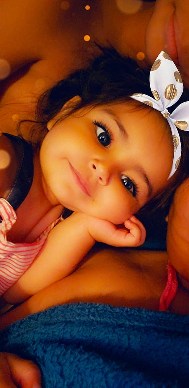 Frida joined the competition — help win amazing prizes! beauty, black_hair, brown_hair, cheek, child, close_up, eye, eyebrow, face, finger, hair, hand, head, lip, mouth, muscle, nose, person, photography, skin