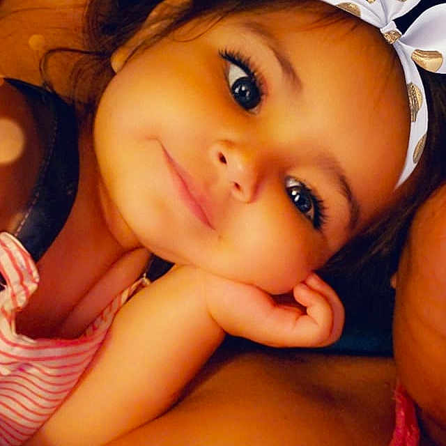 Frida joined the competition — help win amazing prizes! beauty, black_hair, brown_hair, cheek, child, close_up, eye, eyebrow, face, finger, hair, hand, head, lip, mouth, muscle, nose, person, photography, skin