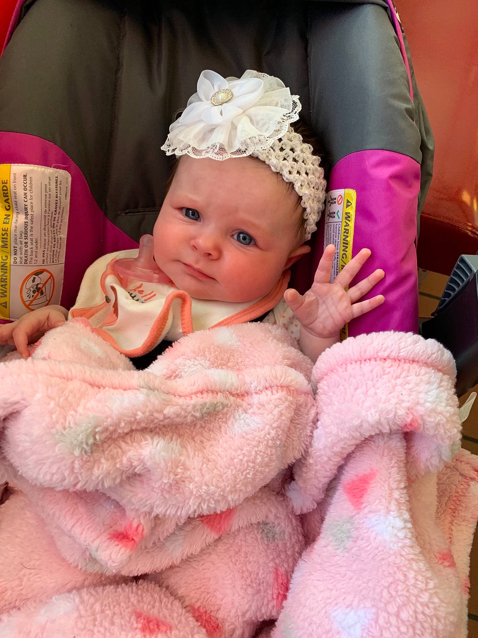 Maddilyn is registered to the contest to win money with this photo: baby, cheek, child, fur, linens, person, pink, skin, smile, textile, toddler