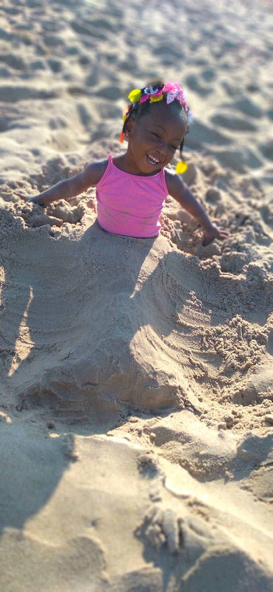 Kylee joined the competition — help win amazing prizes! beach, child, face, fun, happy, hat, joy, landscape, leisure, ocean, people_in_nature, people_on_beach, person, play, recreation, sand, shadow, smile, soil, sunglasses