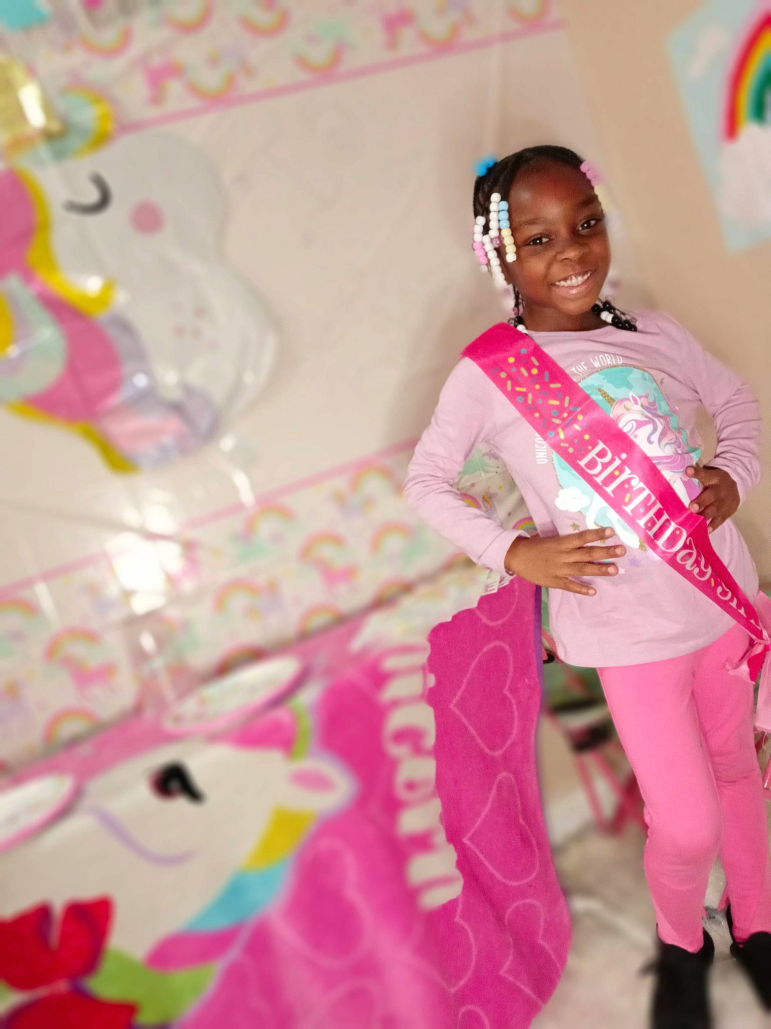 Julie joined the competition — help win amazing prizes! child, costume, design, entertainment, event, fashion_design, fun, happy, joy, leisure, magenta, party, pattern, performing_arts, person, pink, recreation, room, sitting, smile