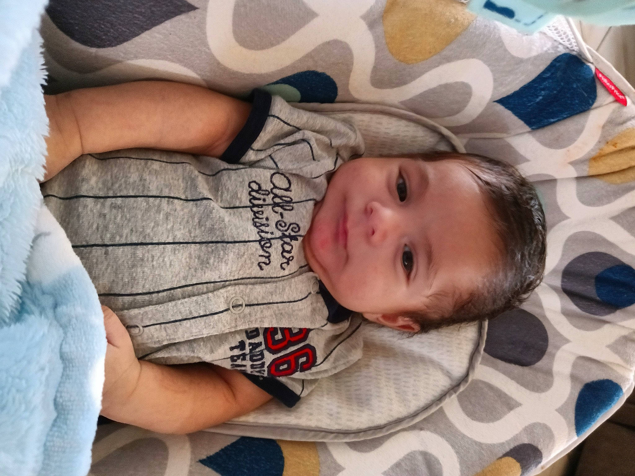 Isaiah joined the competition — help win amazing prizes! baby, baby_toddler_clothing, cheek, child, comfort, eye, face, facial_expression, happy, head, linens, mouth, nose, person, product, skin, sleeve, textile, toddler, tree