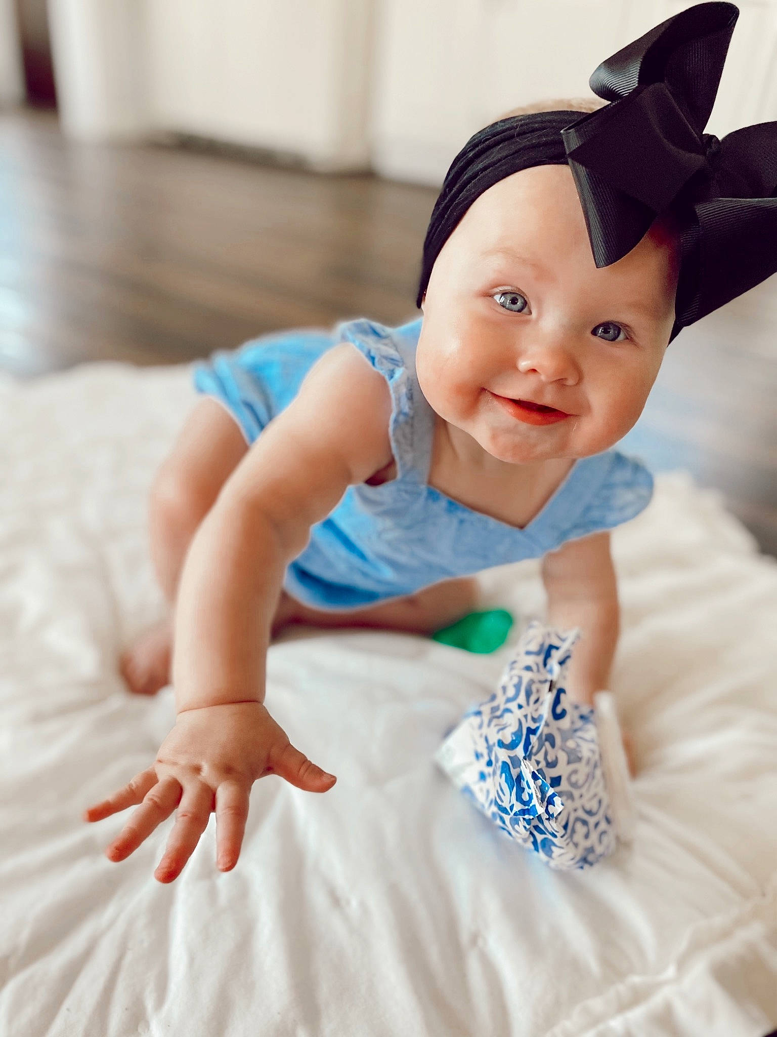 Elle joined the competition — help win amazing prizes! azure, baby, baby_toddler_clothing, beauty, cap, child, costume_hat, electric_blue, event, fun, happy, headpiece, pattern, person, pink, ruffle, skin, sleeve, smile, textile