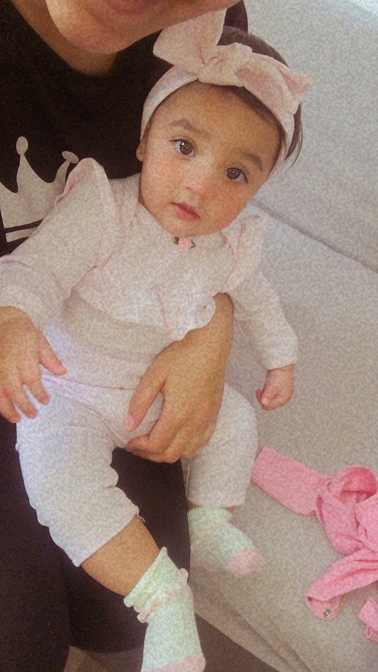 Bianca joined the competition — help win amazing prizes! baby, baby_toddler_clothing, cap, cheek, comfort, dress, fashion_accessory, head, human_body, lip, pattern, person, pink, product, skin, sleeve, sock, textile, thumb, toddler