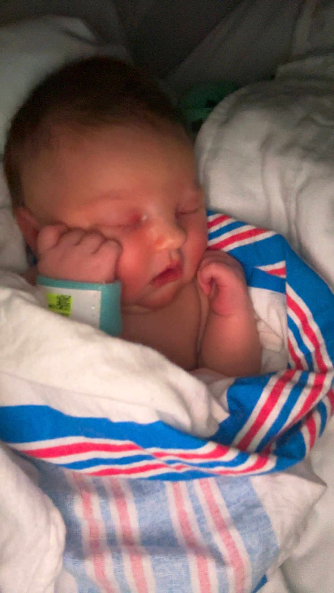 Alexis joined the competition — help win amazing prizes! baby, newborn, sleeping, blanket, hospital_wristband, wrapped, infant, cute, peaceful, child, face, skin, hand, resting, portrait, indoors, soft, cozy, toddler, person