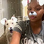 Sadie joined the competition — help win amazing prizes! person, dog, selfie, indoor, tattoo, gray_shirt, dog_filter, face_filter, ear_filter, nose_filter, carpet, door, wall_art, smile, pet, fun, sparkles, casual, portrait, animal