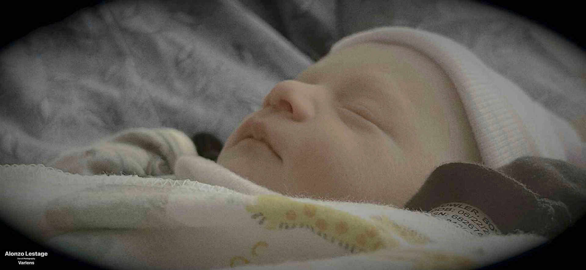 Kolten joined the competition — help win amazing prizes! baby, newborn, sleeping, blanket, hat, closeup, portrait, infant, soft, cozy, peaceful, child, face, resting, indoors, cute, warm, tender, young, wrapped