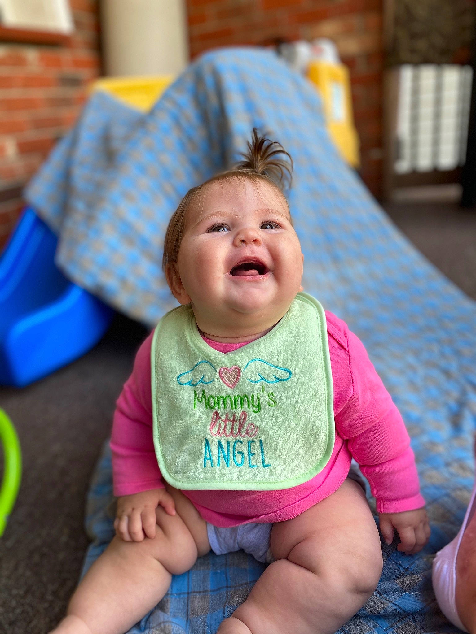 Charlotte is registered to the contest to win money with this photo: baby, baby_toddler_clothing, child, face, facial_expression, fun, happy, laugh, people, person, play, sitting, skin, smile, toddler, vacation
