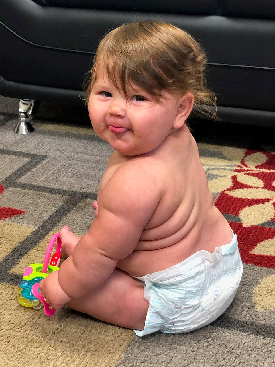 Charlotte is registered to the contest to win money with this photo: abdomen, arm, baby, barechested, blond, cheek, chest, child, diaper, fun, leg, muscle, person, play, sitting, skin, summer, toddler, trunk, vacation