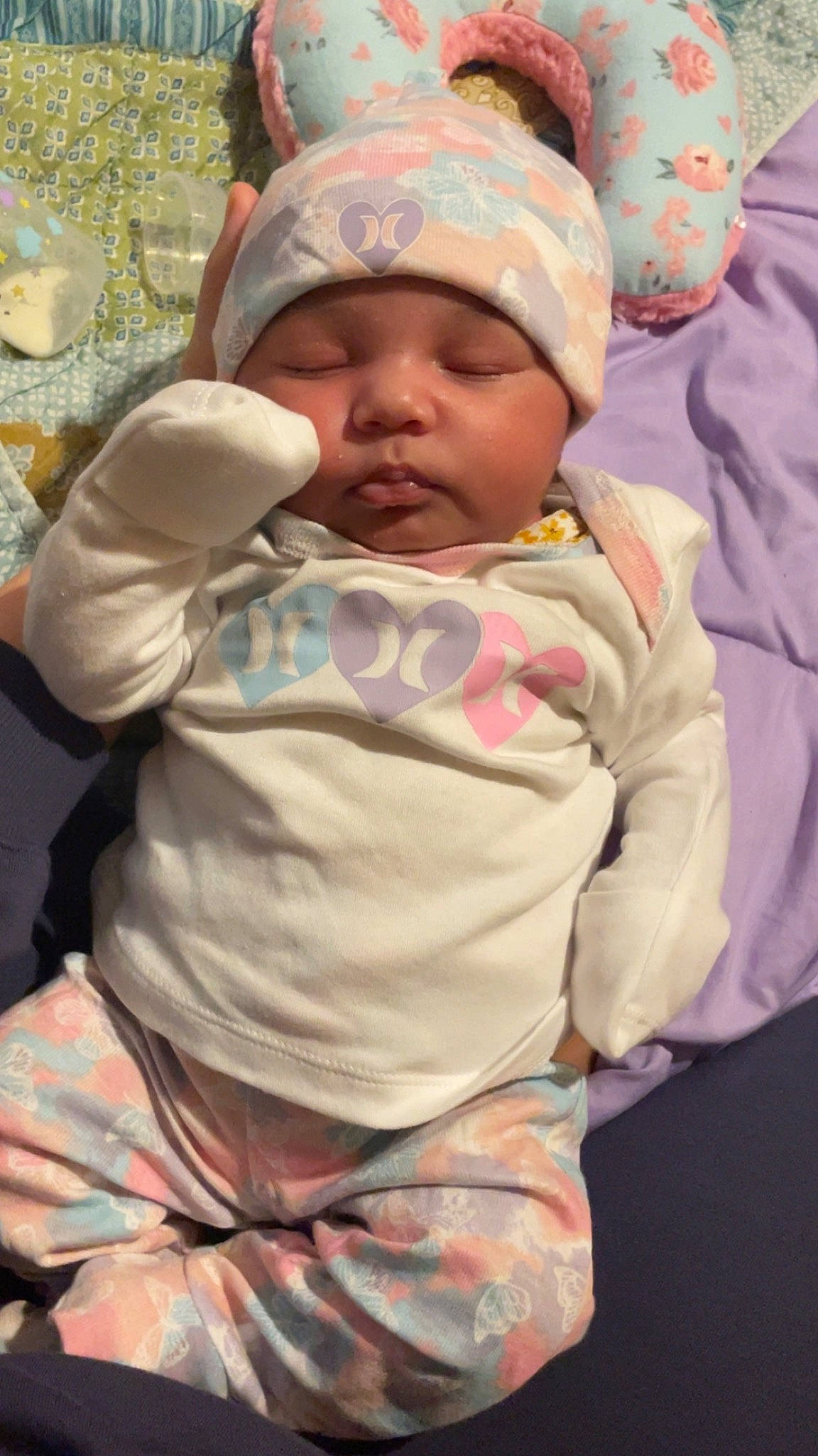 Amora is registered to the contest to win money with this photo: baby, baby_sleeping, baby_toddler_clothing, cap, cheek, child, chin, comfort, eye, happy, head, headwear, human_body, lip, mouth, nose, person, pink, skin, sleeve