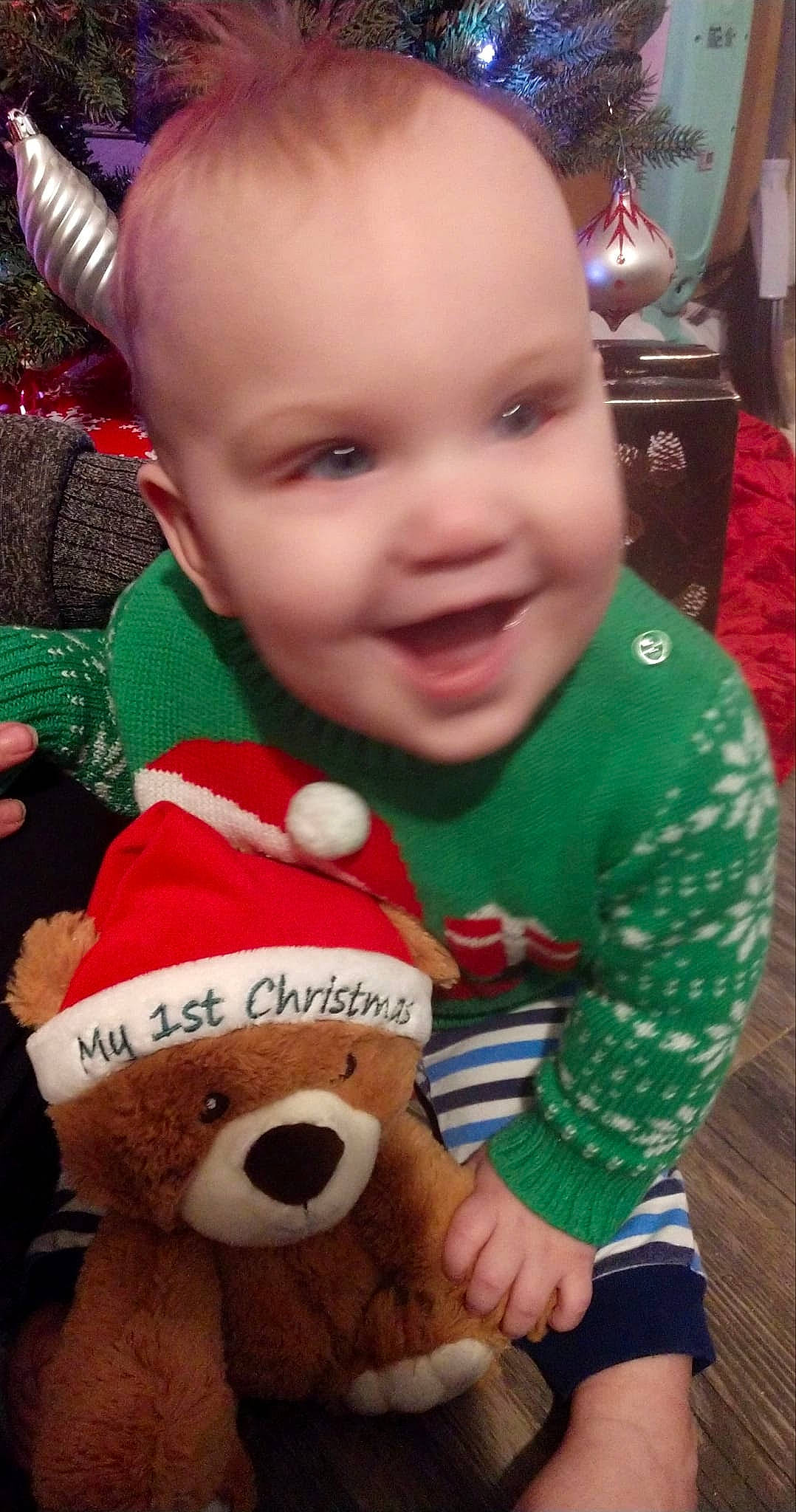 Cassius joined the competition — help win amazing prizes! baby, baby_toddler_clothing, cheek, child, christmas, christmas_eve, christmas_ornament, event, fictional_character, fun, happy, holiday, joy, person, plush, red, skin, smile, snapshot, teddy_bear