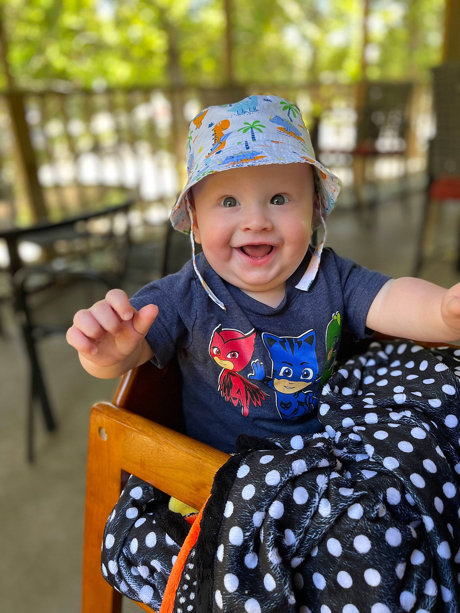 Greysen is registered to the contest to win money with this photo: baby_toddler_clothing, beauty, cap, chair, child, electric_blue, eye, face, fun, grass, happy, hat, headwear, joy, leisure, pattern, person, recreation, sleeve, smile