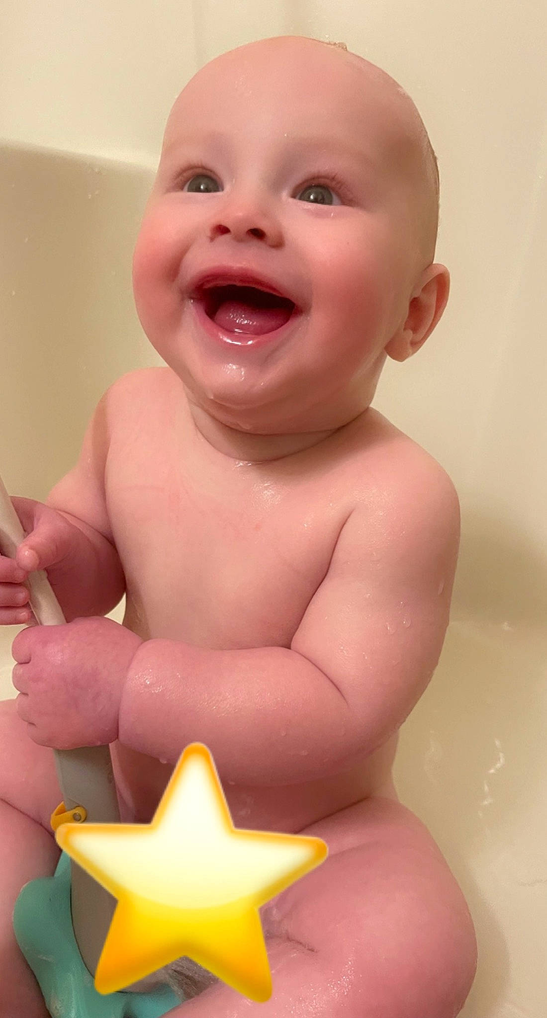 Greysen is registered to the contest to win money with this photo: baby, baby_bathing, baby_playing_with_toys, cheek, chin, face, facial_expression, finger, gesture, happy, iris, joy, lip, mouth, neck, nose, organ, person, product, skin