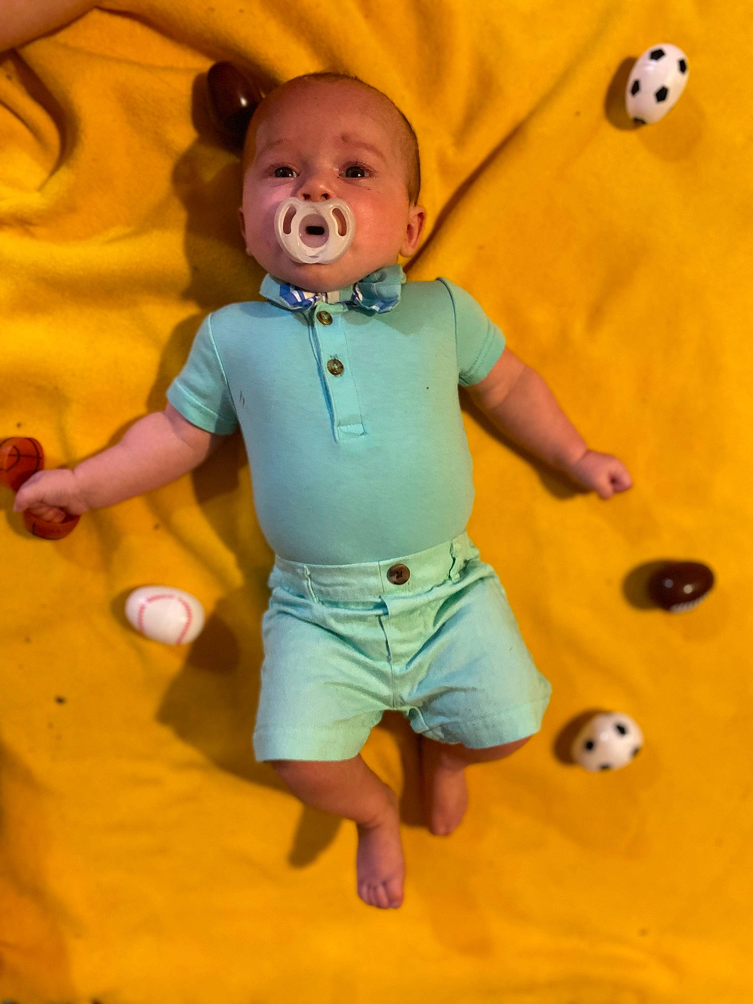 Liam joined the competition — help win amazing prizes! baby, baby_toddler_clothing, baby_toys, ball, child, flooring, fun, happy, leisure, nose, orange, person, play, recreation, room, sitting, smile, textile, toddler, toy